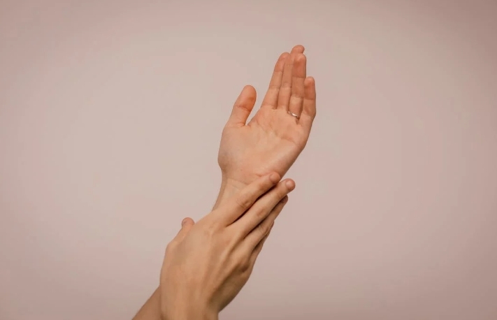 Hands of a patient treated with Juvéderm Volite